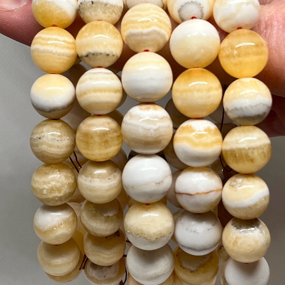Natural Orange Calcite 10 mm beaded bracelet/ elastic stretch